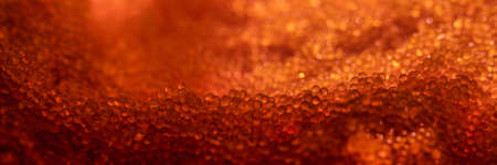 Tobiko, flying fish roe full frame macro close up. Sea of red caviarの写真素材