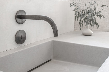 Contemporary and stylish modern metal water faucet and stone sink
