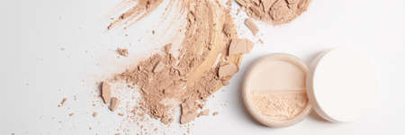 Set with Crashed beige face powder and finishing powder  isolated on white backgroundの写真素材