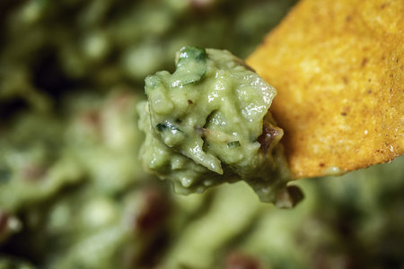 Process of cooking tacos with grilled flank beef steak with handmade guacamole.の写真素材