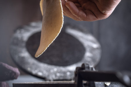 Process of cooking tacos with grilled flank beef steak with handmade guacamoleの写真素材