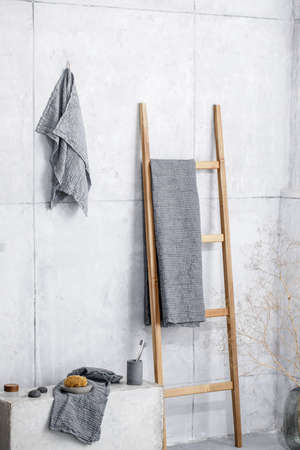 Three eggs and stainless steel Wire Whisk on white backgroundの写真素材