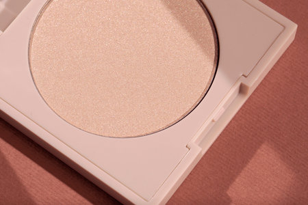 Highlighting Powder macro close up on pink background