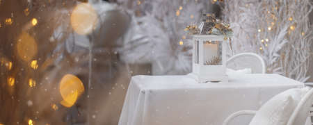 Winter holiday, illumination and decoration concept - bokeh of Christmas garland lightsの写真素材