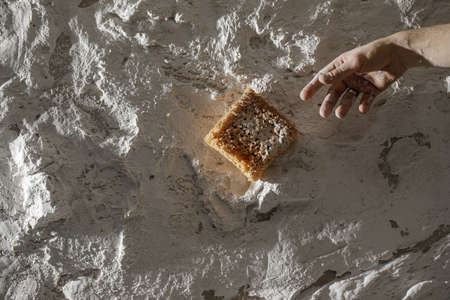 Process of creating white textured clay wall with cracks and imperfections using sponge. Wall design ideas in contemporary interior.の写真素材