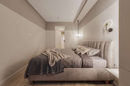 Modern bedroom interior in pastel colours. Trendy minimalistic interior conceptの写真素材