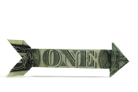 arrow made of usd currency. Shows direction concept, one way, isolated on whiteの写真素材
