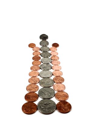 path made of usd currency coins. Consists of pennies and quarters. selective focusの写真素材