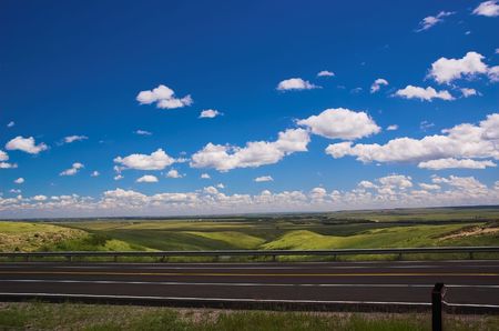 Blue sky and open highway.の写真素材