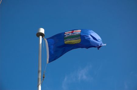 Flag of Alberta Canada blowing in the wind.の写真素材