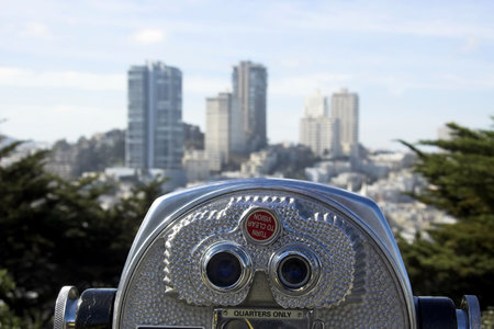 Torist viewing platform and binoculars looking from Coit tower to Russian Hillの写真素材