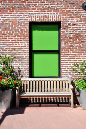 Garden bench located in a old building on the San Francisco wharf at Ghiradelli square.