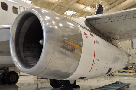 Jet aircraft engine on passenger jet in hangar of a school for training ground crews. 