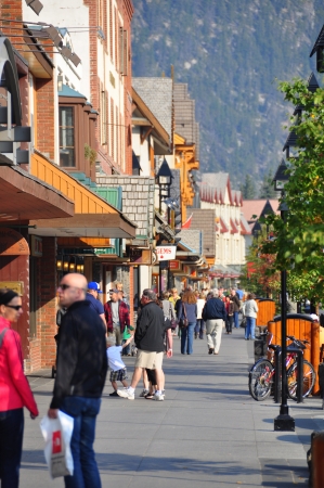 BANFF, ALBERTA - September 24: Banff Avenue on September 24, 2012 in Banff National Park, Alberta, Canada. Banff Avenue is the central shopping district in the town of Banffのeditorial素材