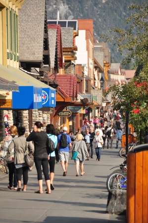 BANFF, ALBERTA - September 24: Banff Avenue on September 24, 2012 in Banff National Park, Alberta, Canada. Banff Avenue is the central shopping district in the town of Banffのeditorial素材