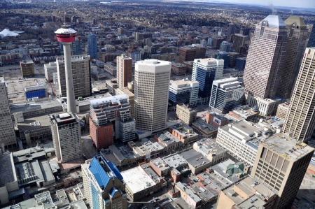 View of the Calgary skyline from the 54th floor skygarden of the Bow Tower in Calgary Alberta. The Bow Tower is a world famous skyscraper.のeditorial素材