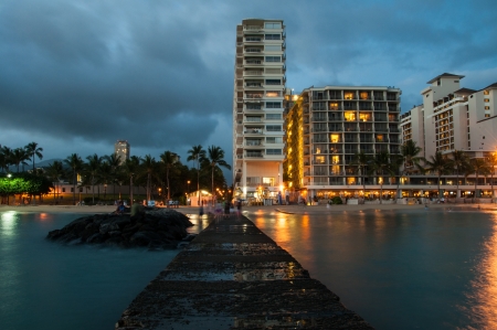 Famous Waikiki Beach on the Hawaiian island of Oahu at night の写真素材