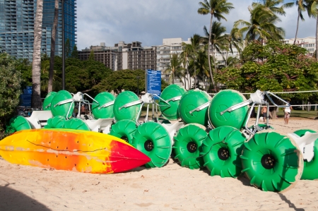 WAIKIKI, HI - June 26 - Water sport rentals waiting for tourists on Waikiki beach June 26, 2013 in Oahu. Waikiki beach is beachfront neighborhood of Honolulu, best known for white sand and surfing.のeditorial素材