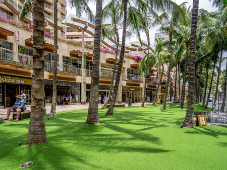 Popular shopping strip of Kalakaua Avenue on April 25, 2014 in Waikiki, Hawaii  Kalakaua Avenue is the favorite shopping strip for tourists visiting Hawaii  のeditorial素材