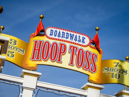 Signage at the Hoop Toss on the Boardwalk at the Boardwalk Hotel at Disney World.のeditorial素材