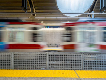 The Ctrain speeding into Westbrook stations on May 24 2015 in Calgary Alberta. The Ctrain is...