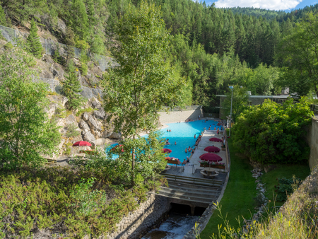 RADIUM HOT SPRINGS, CANADA - AUG 8, 2015: The Radium Hot Springs Pool on August 8, 2015 in the Canadian Rockies. Radium Hot Springs is located in Kootenay National Parks and is a popular destination.のeditorial素材