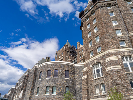 BANFF, CANADA - AUG 9, 2015: The Banff Springs Hotel on August 9, 2015 in the Canadian Rockies. The Banff Springs Hotel was built during the 19th century in Scottish Baronial style.のeditorial素材
