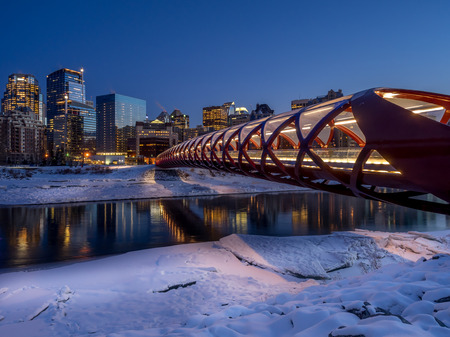 Calgary skyline at night along the Bow River in Calgary, Alberta Canada.のeditorial素材