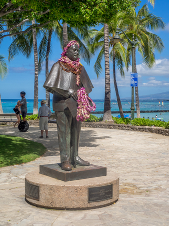 HONOLULU, USA - AUG 8: Prince Jonah Kuhio Kalaniana'ole on August 8, 2016 in Honolulu, Hawaii. It is located on the beachside sidewalk across from the St. Augustine Cathedral on Kalakaua Avenue.のeditorial素材