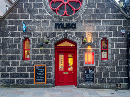 ABERDEEN, SCOTLAND: JULY 24: The Musa food, art and music venue in the evening on July 24, 2017 in Aberdeen, Scotland. Musa is a popular spot for Aberdeen nightlife.のeditorial素材