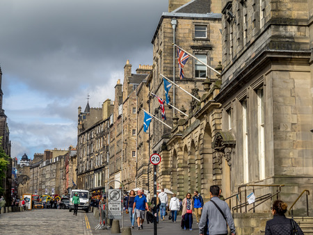 EDINBURGH, SCOTLAND - JULY 26: Looking down the Royal Mile in the Old Town on July 26, 2017 in Edinburgh Scotland. The Royal Mile is the most popular attraction in Edinburgh and hosts many tourists.のeditorial素材