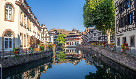 Strasbourg, France - July 25, 2018: Beautiful views along the Ill River in Petite France areas of Strasbourg in the Alsace region of France. The homes are the traditional half timbered houses visible.のeditorial素材