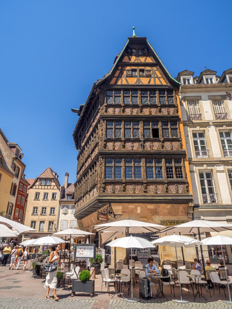 Strasbourg, France - July 26, 2018: Beautiful buildings in Cathedral Square of Strasbourg in the Alsace region of France. Many structures are of the traditional half timbered architecture.のeditorial素材