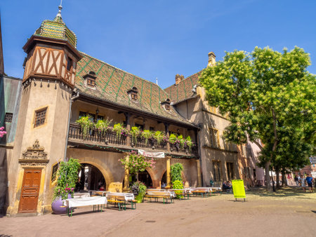 Colmar, France - July 27, 2018: Beautiful buildings in the heart of medieval Colmar in the Alsace region of France. Many structures are of the traditional half timbered architecture.のeditorial素材