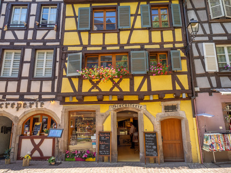 Colmar, France - July 27, 2018: Beautiful buildings in the heart of medieval Colmar in the Alsace region of France. Many structures are of the traditional half timbered architecture.のeditorial素材