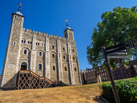 The White Tower inside the Tower of London on a warm summer day. This historic Norman Castle is England's most famous tourist attraction and a potent symbol.のeditorial素材