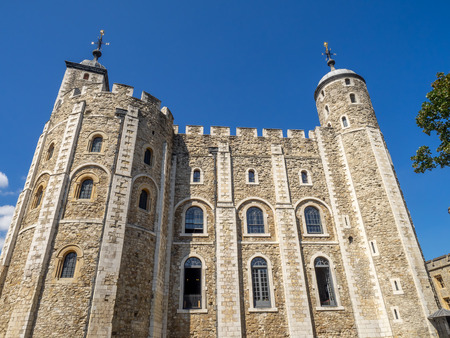 The White Tower inside the Tower of London on a warm summer day. This historic Norman Castle is England's most famous tourist attraction and a potent symbol.のeditorial素材