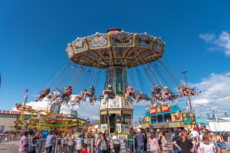 Calgary, Alberta - July 13, 2019: Sights and sounds of the Calgary Stampede grounds. The Calgary Stampede is one of the largest agricultural, rodeo and midways in the world.のeditorial素材