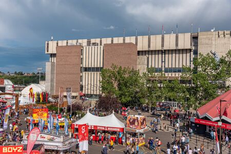 Calgary, Alberta - July 13, 2019: Sights and sounds of the Calgary Stampede grounds. The Calgary Stampede is one of the largest agricultural, rodeo and midways in the world.のeditorial素材