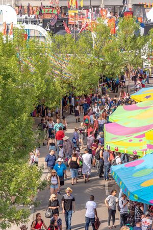 Calgary, Alberta - July 13, 2019: Sights and sounds of the Calgary Stampede grounds. The Calgary Stampede is one of the largest agricultural, rodeo and midways in the world.のeditorial素材