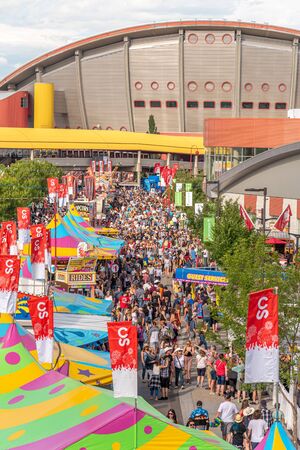 Calgary, Alberta - July 13, 2019: Sights and sounds of the Calgary Stampede grounds. The Calgary Stampede is one of the largest agricultural, rodeo and midways in the world.のeditorial素材