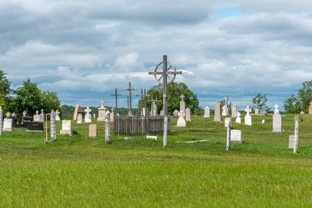 The Saint Antoine de Padoue Roman Catholic cemetery at Batoche, Saskatchewan.のeditorial素材