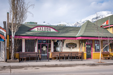 Canmore, Alberta - April 4, 2020: View of businesses in the mountain town of Canmore Alberta. Canmore is a popular tourist destination close to Banff National Park.のeditorial素材