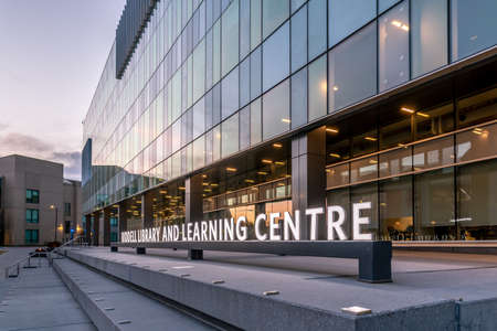 Calgary, Alberta - May 2, 2020: The Riddell Library and Learning Centre on the Mount Royal University campus in Calgary at night. MRU is one of Calgary's big universitiesのeditorial素材
