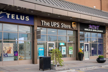 Calgary, Alberta - May 30, 2021:  Exterior facade of a The UPS Store in Calgary, Alberta.のeditorial素材