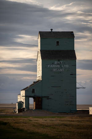 Brant, Alberta - May 7, 2021: Brant's old Alberta Wheat Pool grain elevator.のeditorial素材