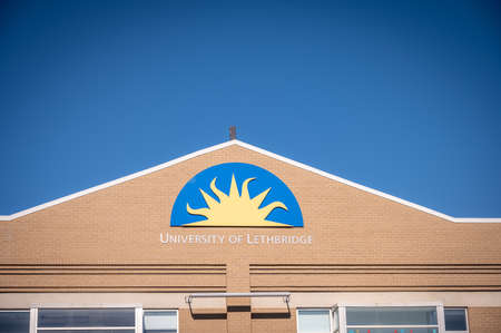 Lethbridge, Alberta - June 13, 2021: Logo on a building at the University of Lethbridge.のeditorial素材