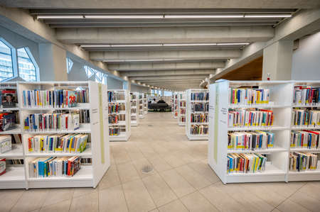 Calgary, Alberta - February 6, 2022: Interior of Calgary`s Central Branch of the Calgary Public Library. The library opened in November 2018 and was designed by renowned Snohetta firm.のeditorial素材