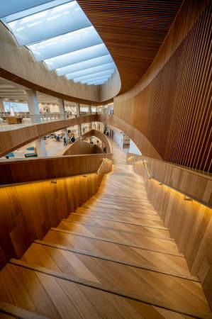 Calgary, Alberta - February 6, 2022: Interior of Calgary`s Central Branch of the Calgary Public Library. The library opened in November 2018 and was designed by renowned Snohetta firm.のeditorial素材