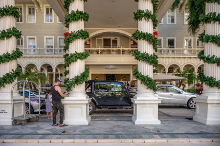 Honolulu, Hawaii - December 30, 2022: The landmark Moana Surfrider decorated for Christmas celebrations.のeditorial素材